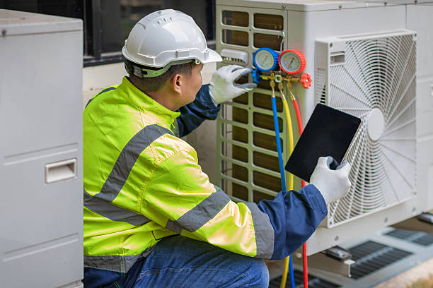 Professional Ductwork Repair technician working in Chester, WV